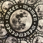 Load image into Gallery viewer, A 3-inch black and white circular sticker depicting the moon sits against a focus-blurred collage of the same sticker. The words "water, women, werewolves" in a gothic typeface form a ring around the perimeter.
